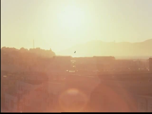 Sunrise Haze Over Rooftops